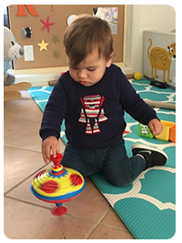 Aiden with TOP toy